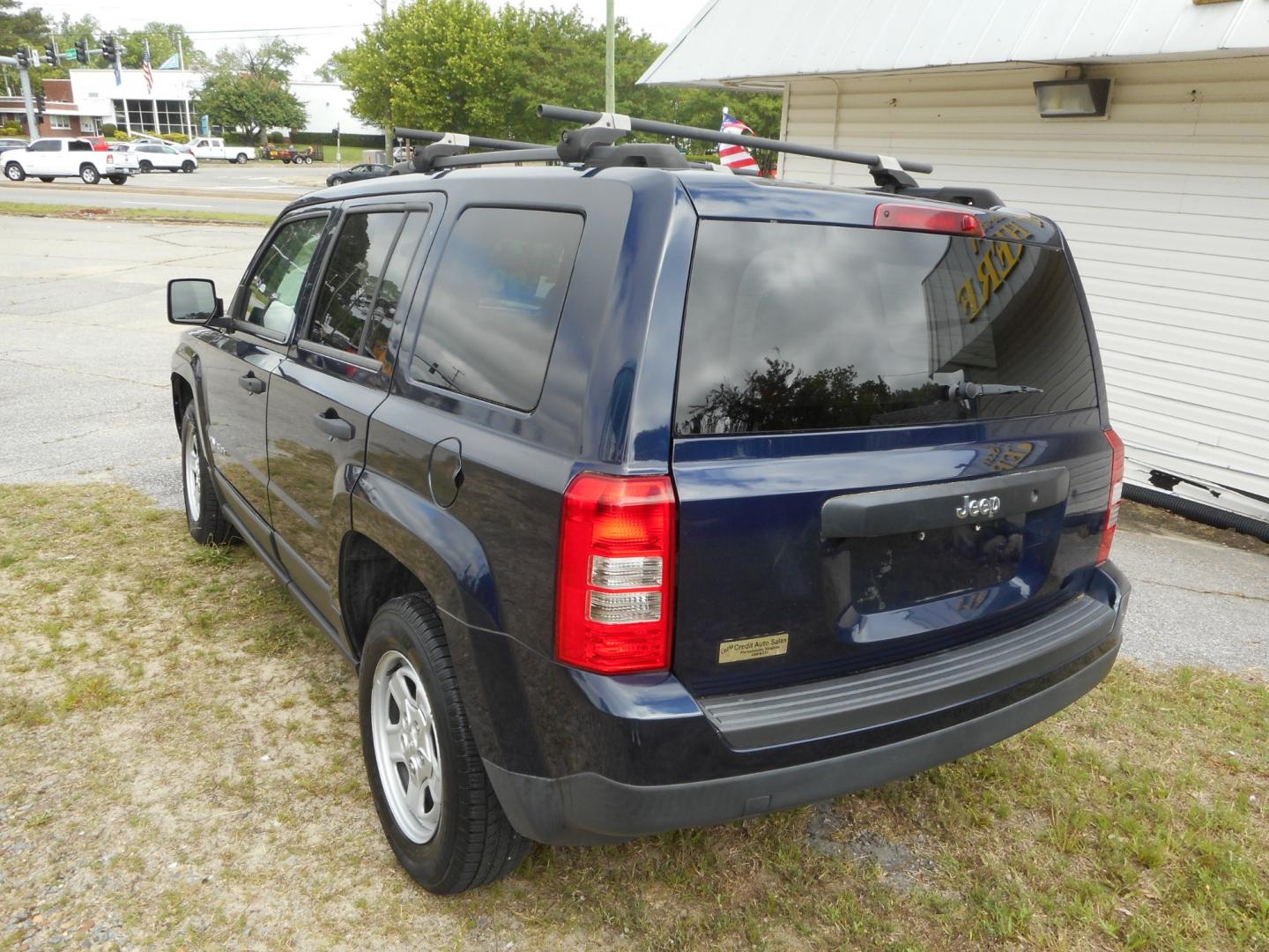 2014 Blue Jeep Patriot Sport 2WD (1C4NJPBA5ED) with an 2.0L L4 DOHC 16V engine, located at 2553 Airline Blvd, Portsmouth, VA, 23701, (757) 488-8331, 36.813889, -76.357597 - Photo#7